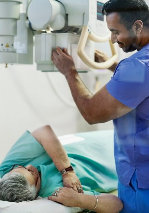 Provider preparing patient for x-ray